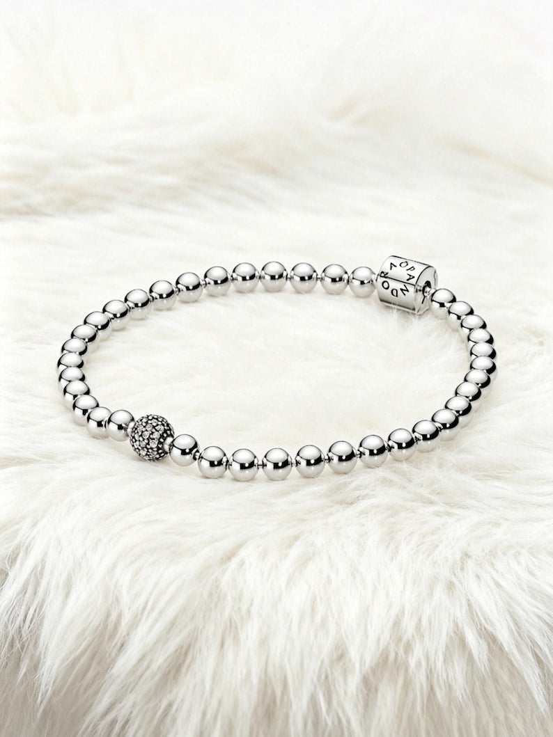 Pulseira de prata de lei S925 com contas e pavé, uma joia perfeita para presentear.